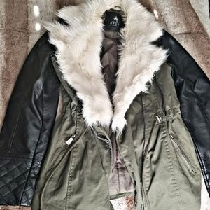Green jacket with large fur collar